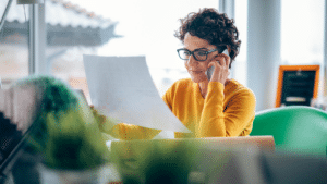 woman looking at paper
