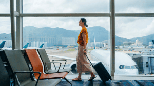 woman walking with suitcase