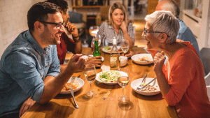 family talking around a dinner table